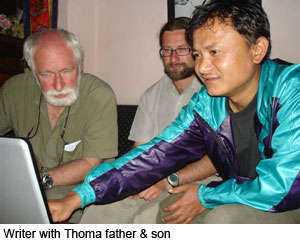 Writer with Thoma father and son